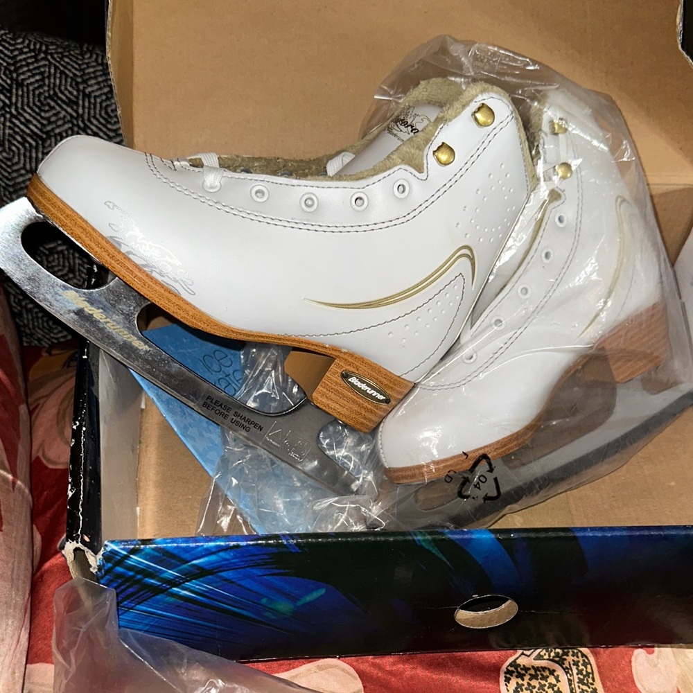 White Ice Skates with Gold Accents